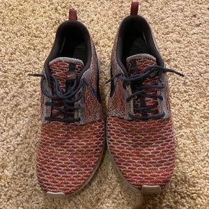 Nike waffle knit shoes.  red and grey.  size 10.5